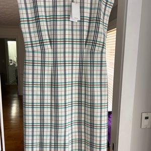 Designer tailed dress business or casual